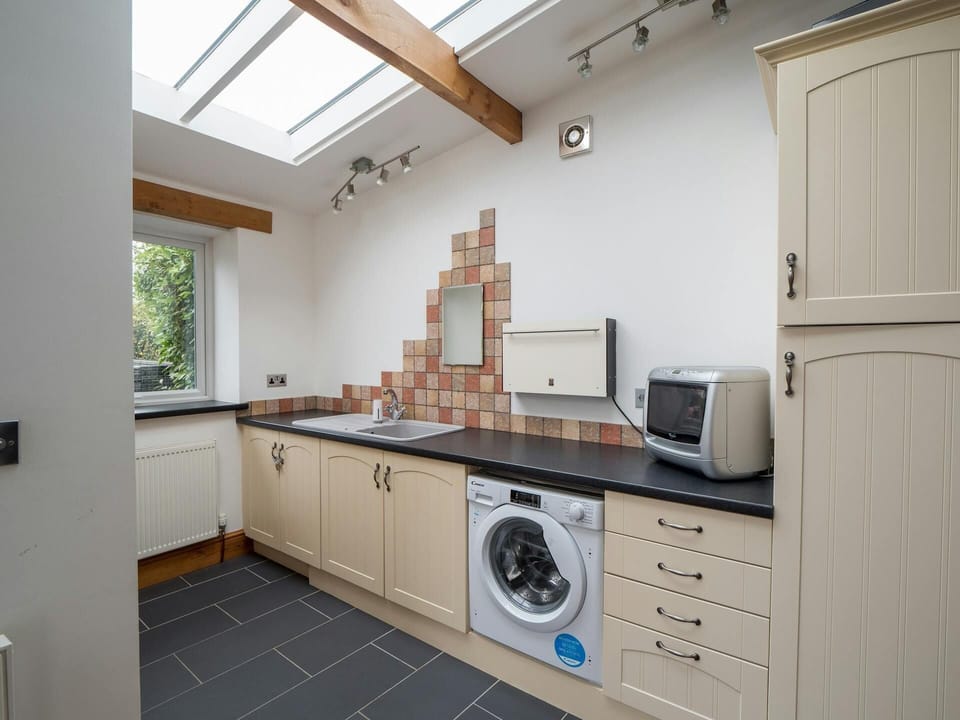 Washing machine, sink, and draws and cupboards