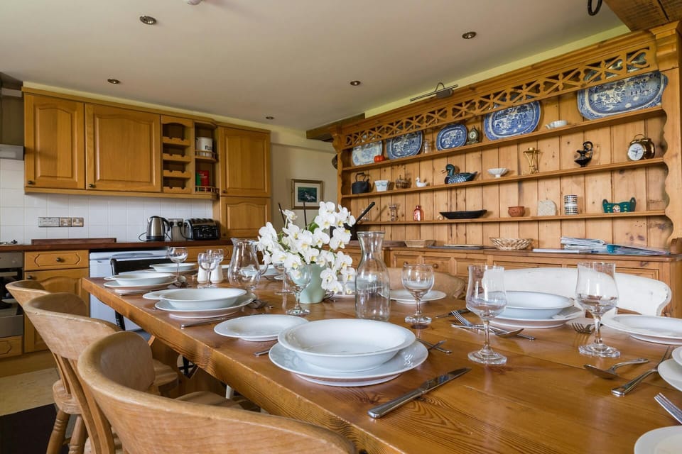 Kitchen/dining area: well equipped kitchen, dining table with eight chairs and large pine Welsh Dresser