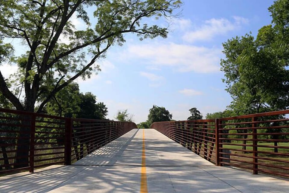 The Moments in Time Hike & Bike Trail is an eight-foot wide concrete trail traversing 2.93 miles from the Granbury Airport to Hewlett Park. Only 13 minutes away! 