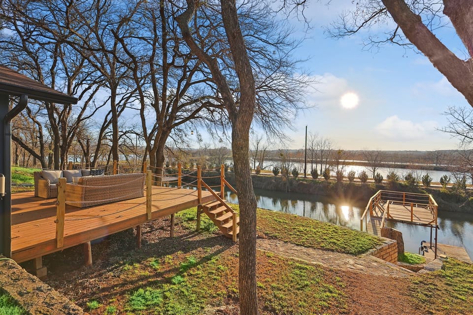 Large deck with comfortable furniture to enjoy the river views! 