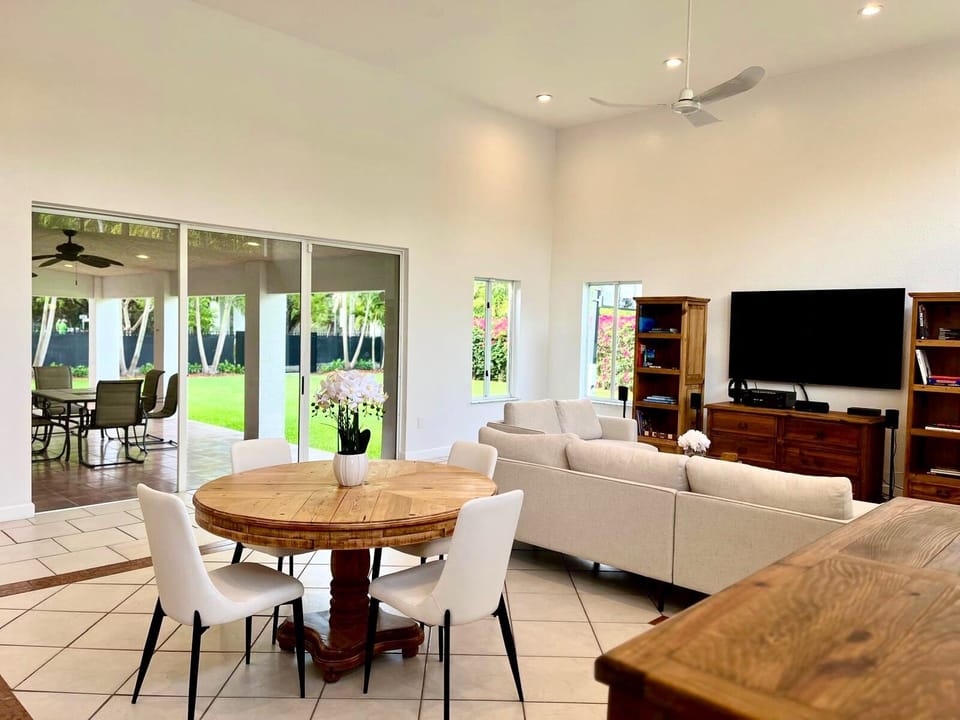 Florida Room with terrace & garden access and vews