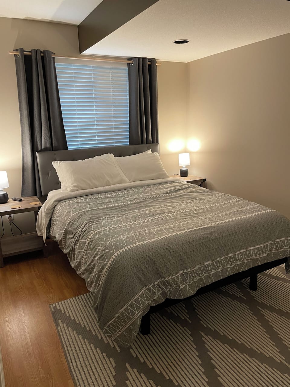 Bedroom with adjustable queen bed and double closet