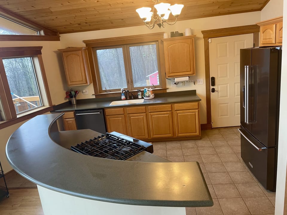 Gourmet kitchen all Kitchenaid Appliances with Gas Stove/Oven.