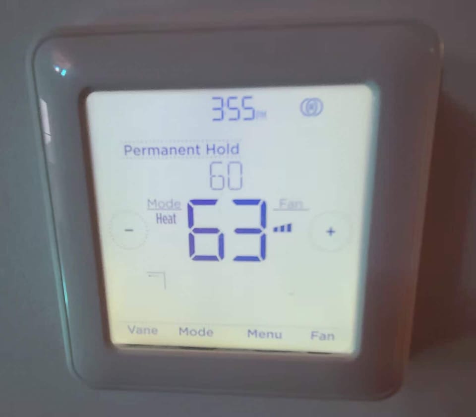 Thermostat does heat and AC. New insulation and new windows make the space cozy.
