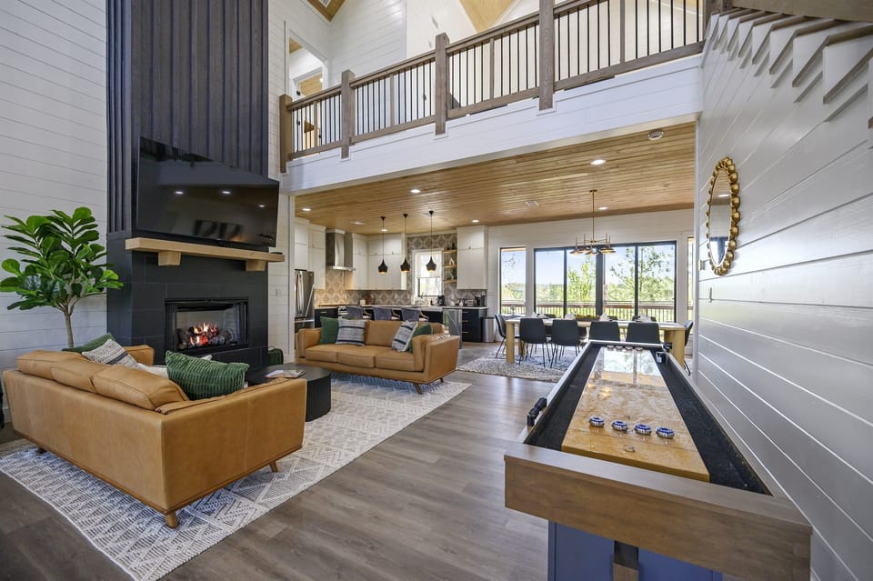 Soak in the beauty of the living area filled with natural light, or cozy up near the fireplace on a chilly night.