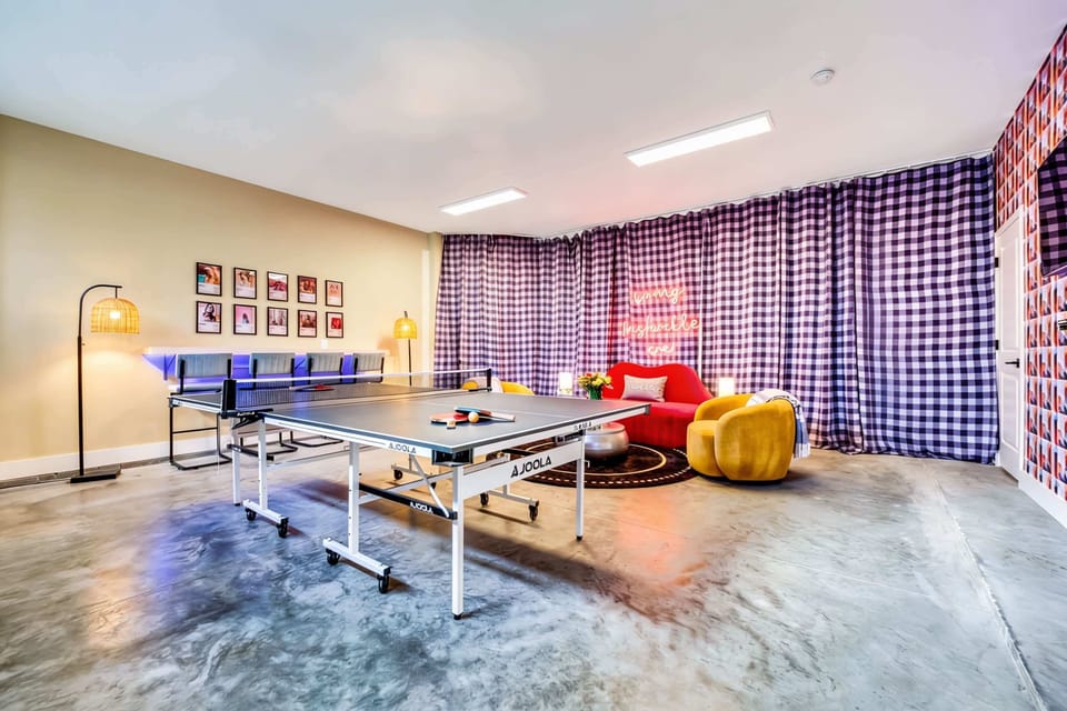 Gather your crew for a fun-filled getaway in this vibrant game room, perfect for laughter and friendly competition! Experience the heart of Music City with Misfit Homes. Reserve your stay today!