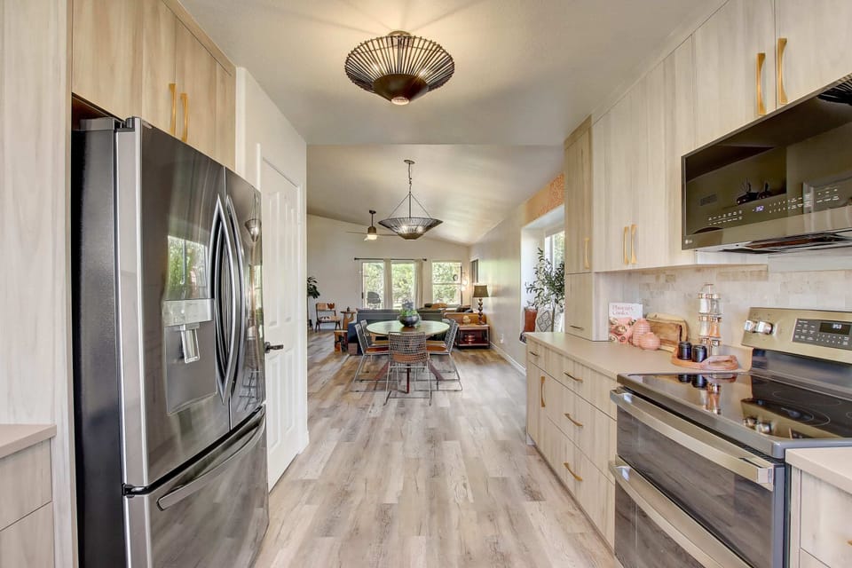 With its well-organized layout and essential appliances, the kitchen facilitates efficiency and convenience in meal preparation.