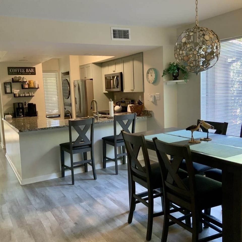 dining and kitchen - washer & dryer off of kitchen