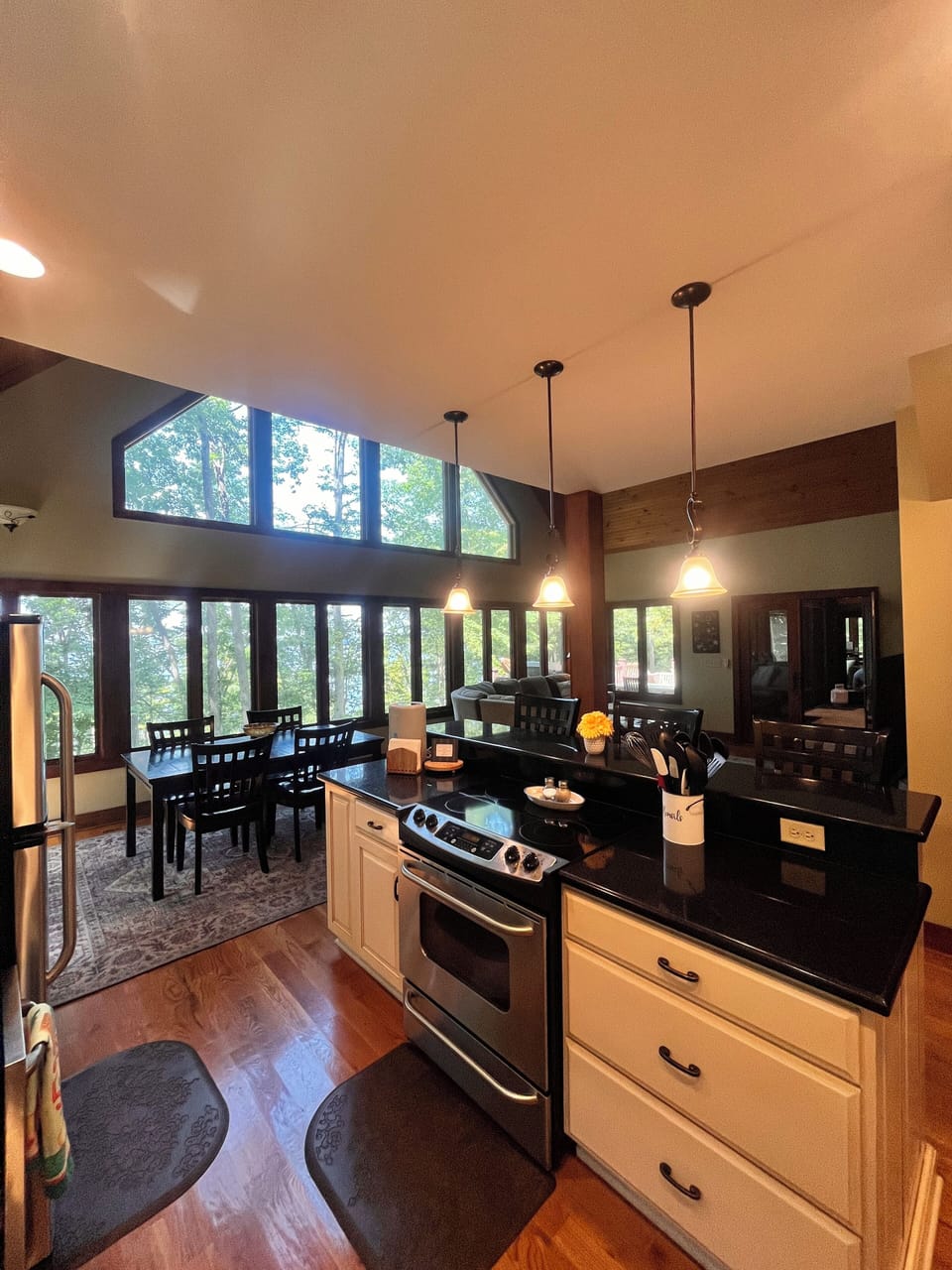 Dining table and bar provide seating for 8.