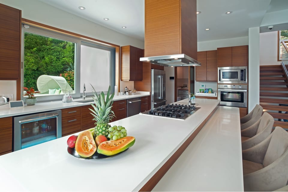 Expansive Chefs kitchen with wine refrigerator