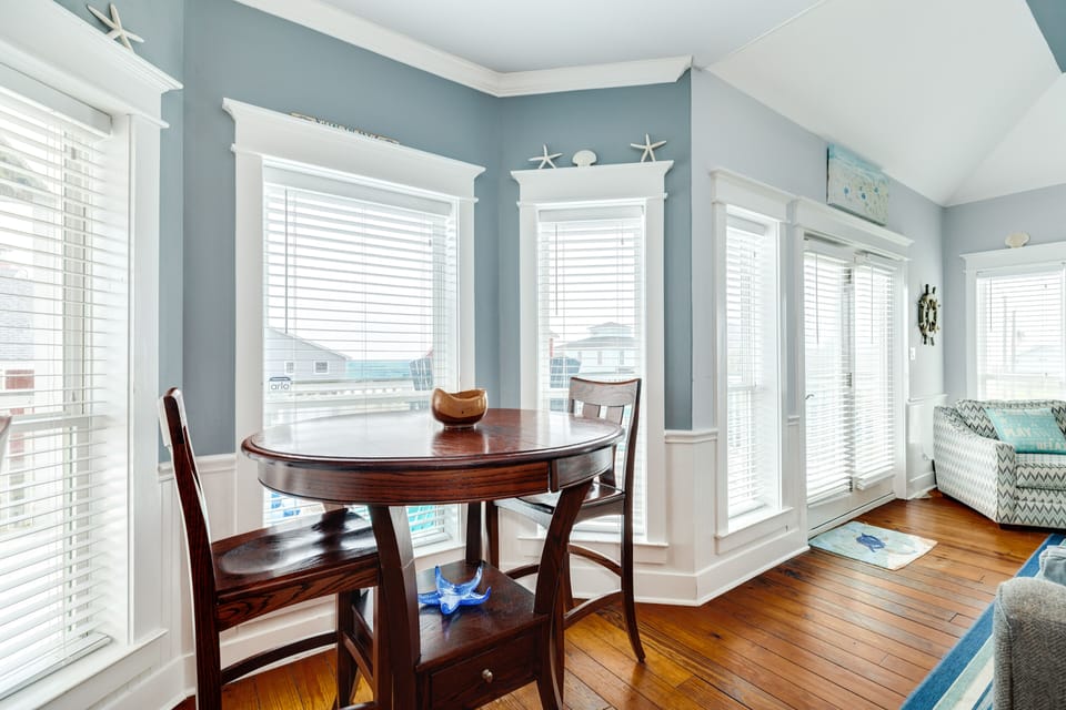 High top table with seating for 2, a perfect place to enjoy your morning coffee