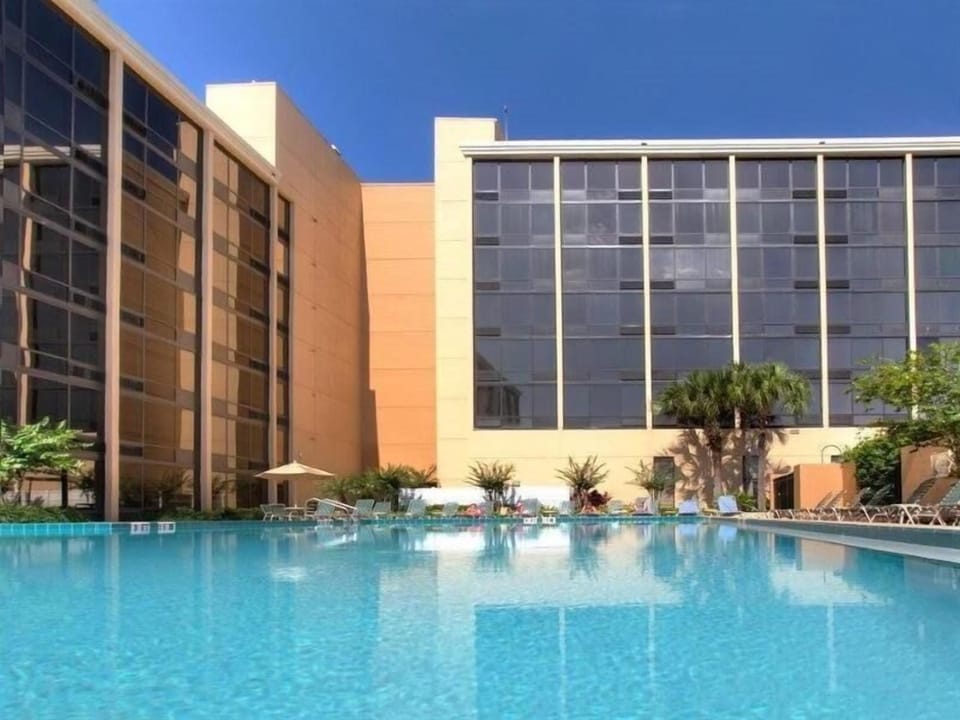 Cool off with a refreshing swim in the sunlit courtyard pool.
