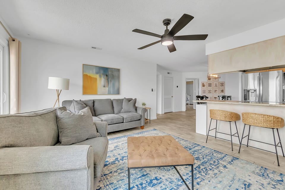 Sink into this plush sectional and feel right at home in your modern open-plan living space, where thoughtful design meets everyday comfort.