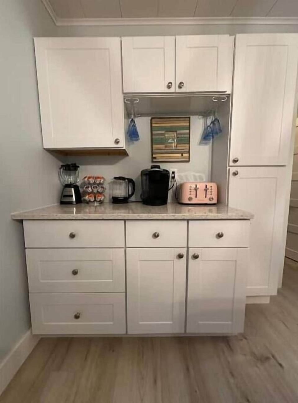 Coffee bar with complimentary coffee, tea and hot chocolate and appliances