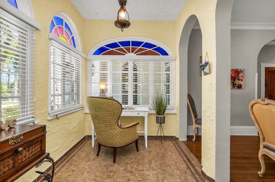 Retreat to the small den with a personal desk and chair for remote work or study.