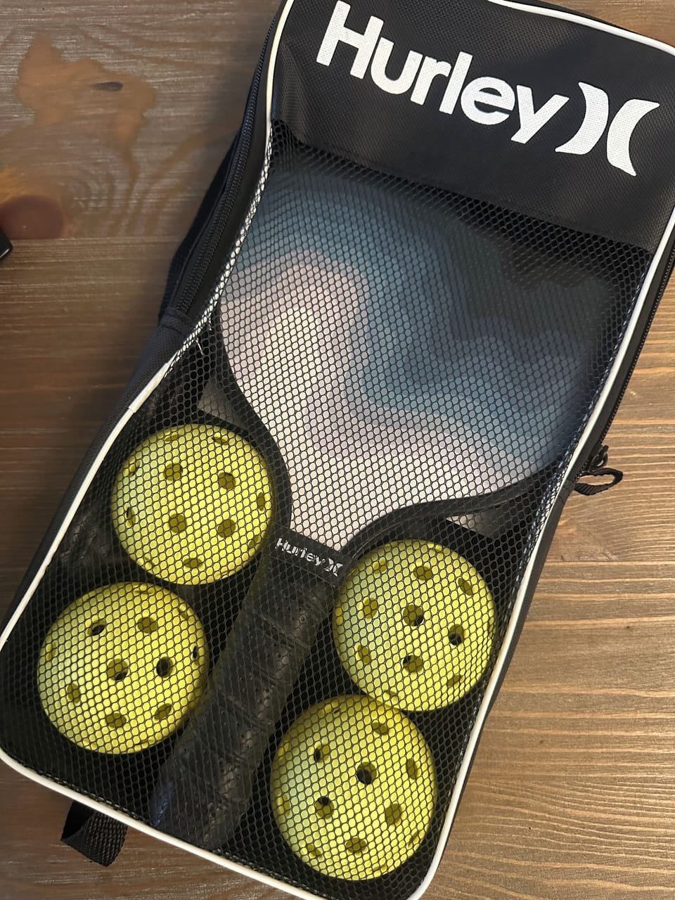 Pickle Ball Paddle and Balls ready for use.