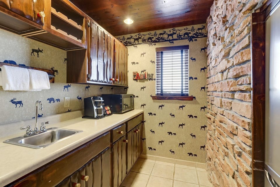 Prep quick snacks and coffee at the cozy kitchenette nook.