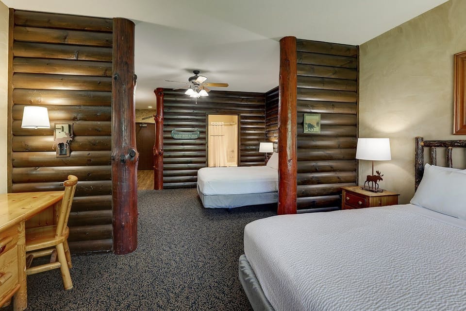 Stretch out comfortably in this spacious, lodge-style bedroom.