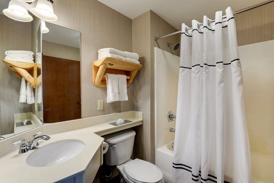 Recharge easily with in-room snacks and convenient refreshment station.