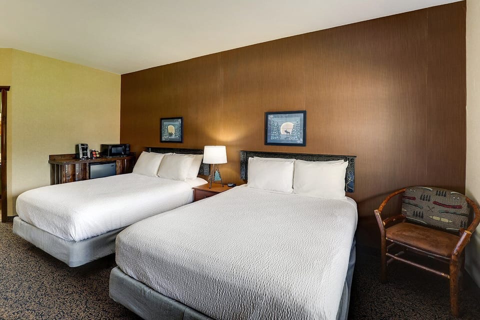 Relax together with spacious beds and a cozy corner seat