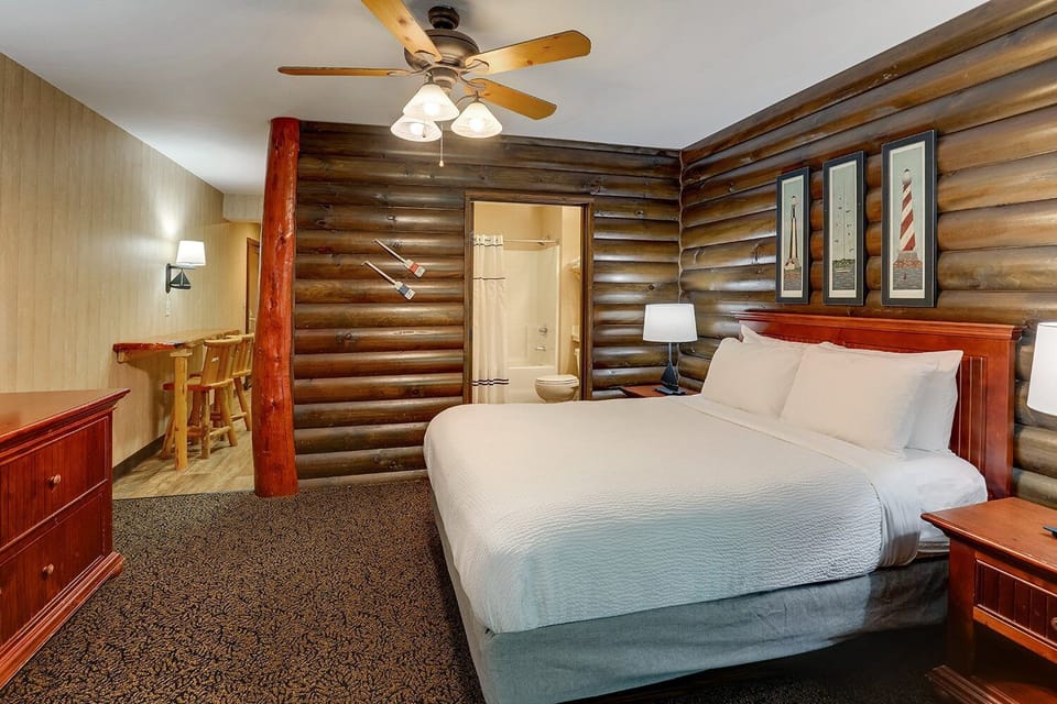 Stretch out comfortably with warm lighting and rustic cabin charm.