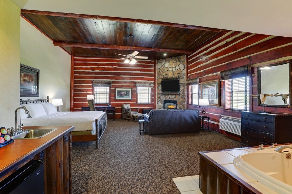 Soak and savor lodge-style comfort beside a warming fireplace.