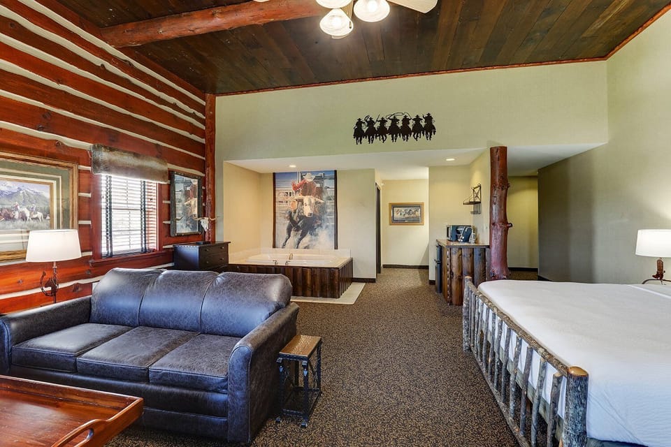 Lounge in the open suite with cabin charm and room to breathe.