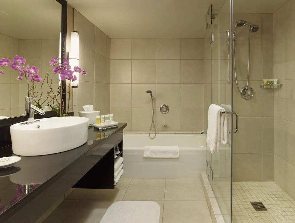 Start your morning with bright vanity lighting and fresh towels.