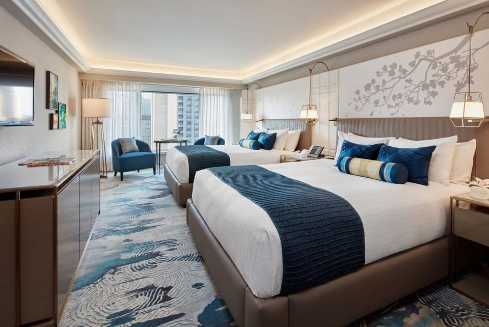Settle into two crisp beds under soft, calming lighting.