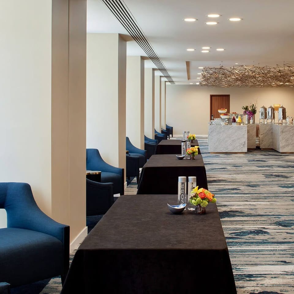 Gather for coffee chats in a sleek, comfortable pre-function lounge.