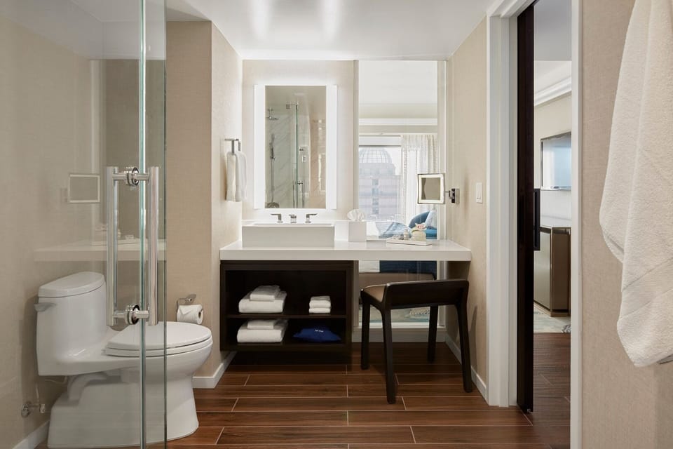 Get ready comfortably with bright mirrors and ample counter space.