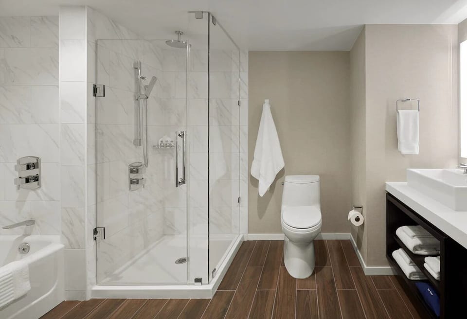 Step into the roomy shower after a day exploring.