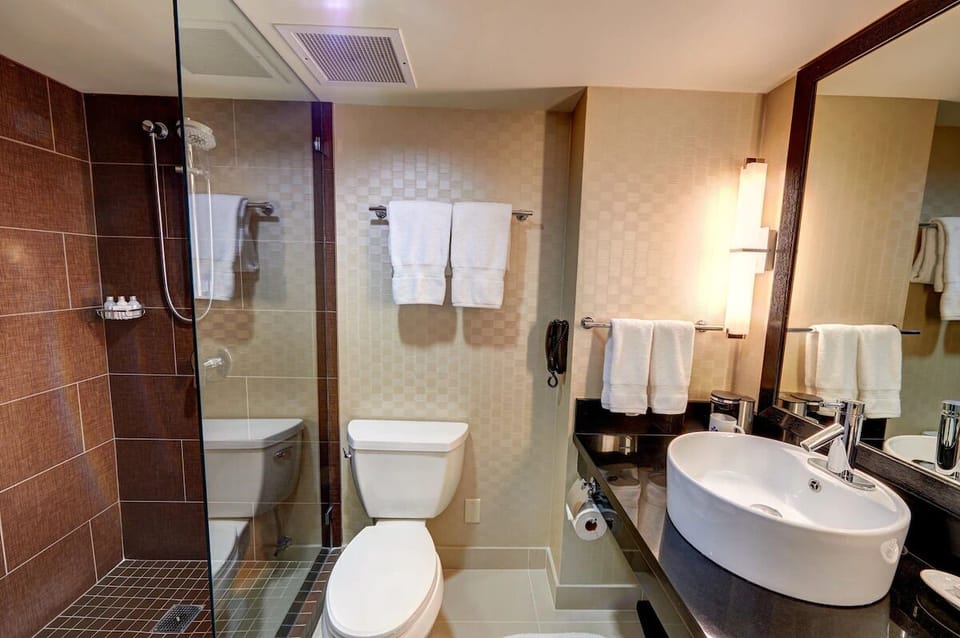 Freshen up easily with a convenient shower and vanity.