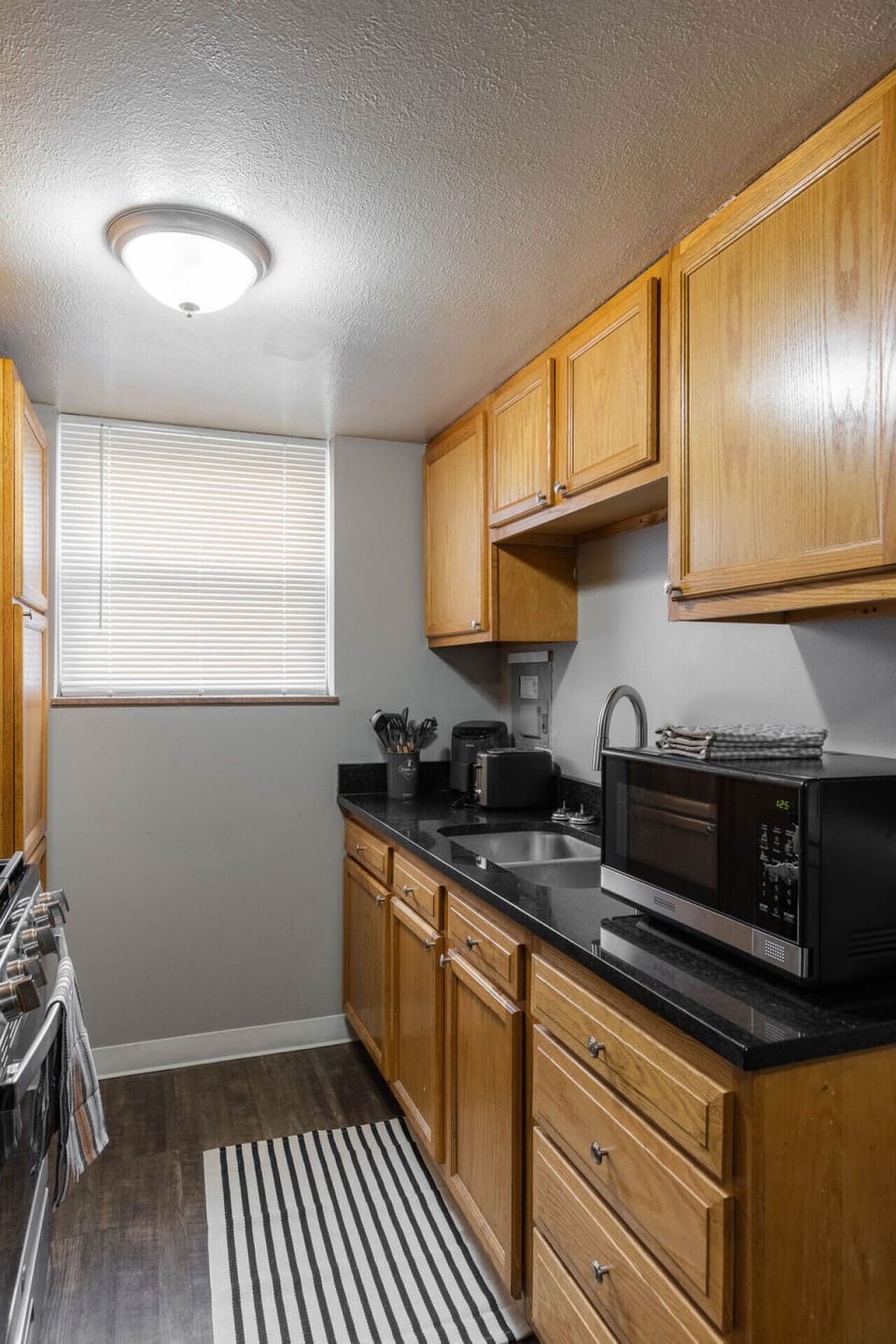 Prepare your favorite dishes in this fully equipped kitchen, furnished with all essential cooking utensils