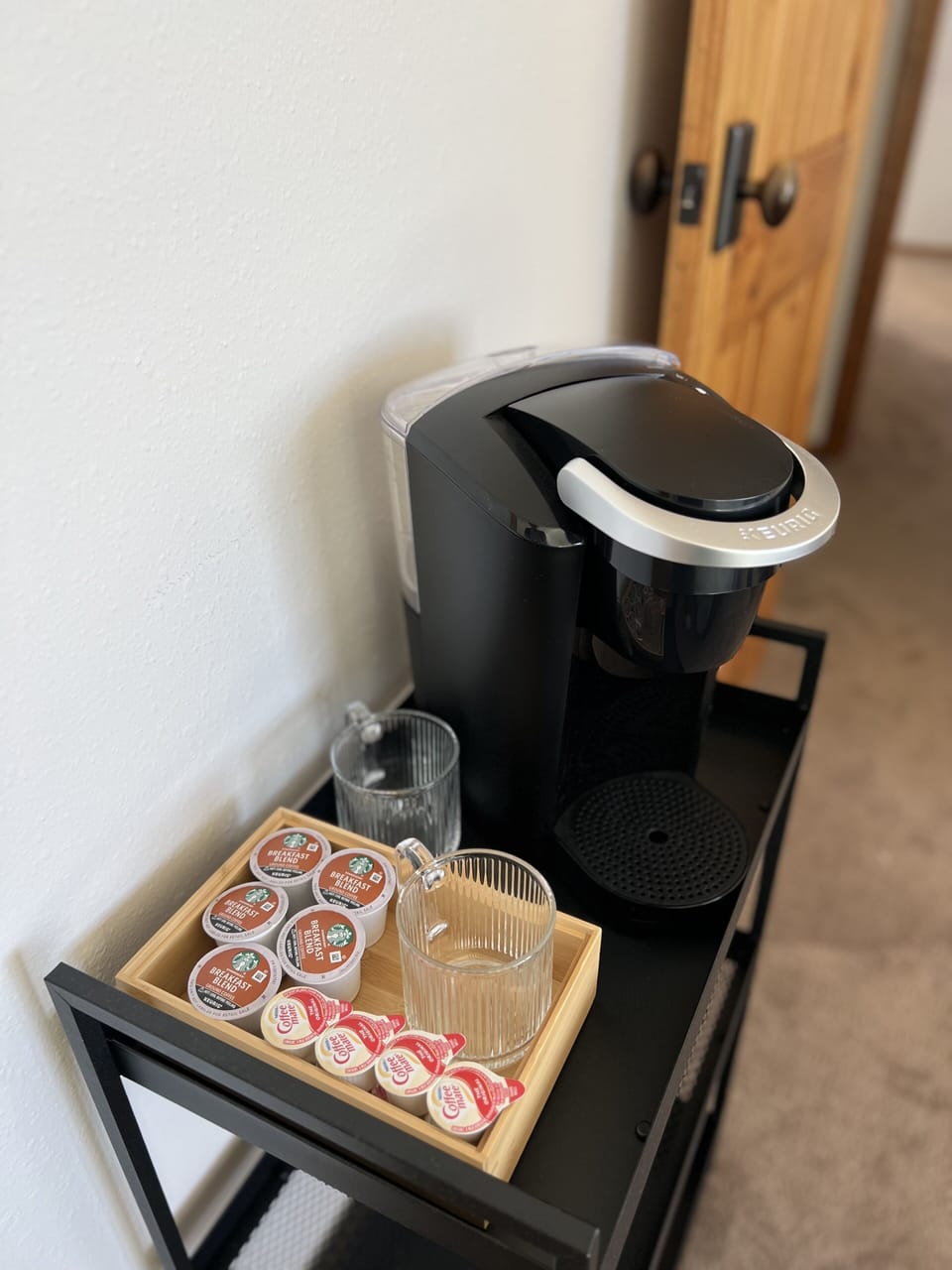 Wake up to a cup of Starbucks from the ensuite Keurig coffee bar