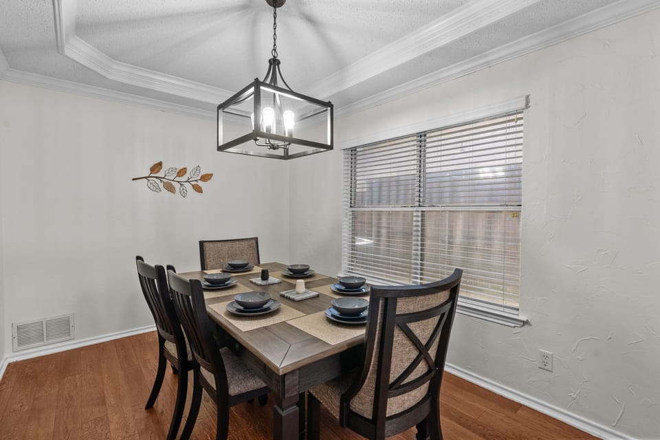 Share meals, laughter, and memories in this stylish dining area.