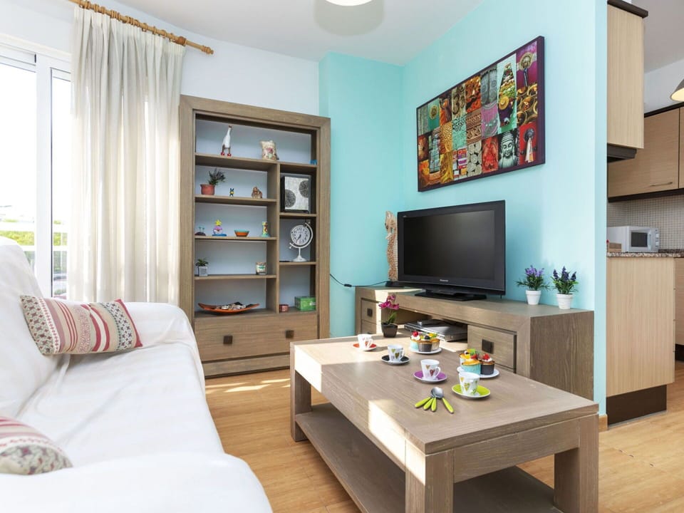 Furniture, Property, Table, Couch, Shelf, Bookcase, Interior Design, Shelving, Home Appliance, Comfort