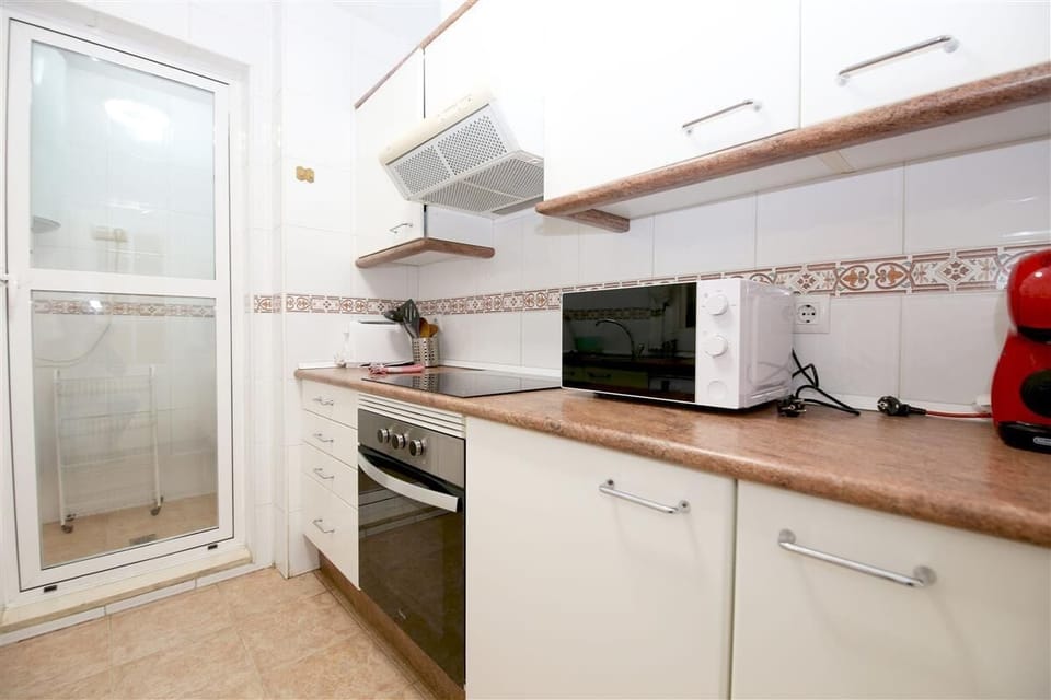 Another view of the fully fitted kitchen in this property