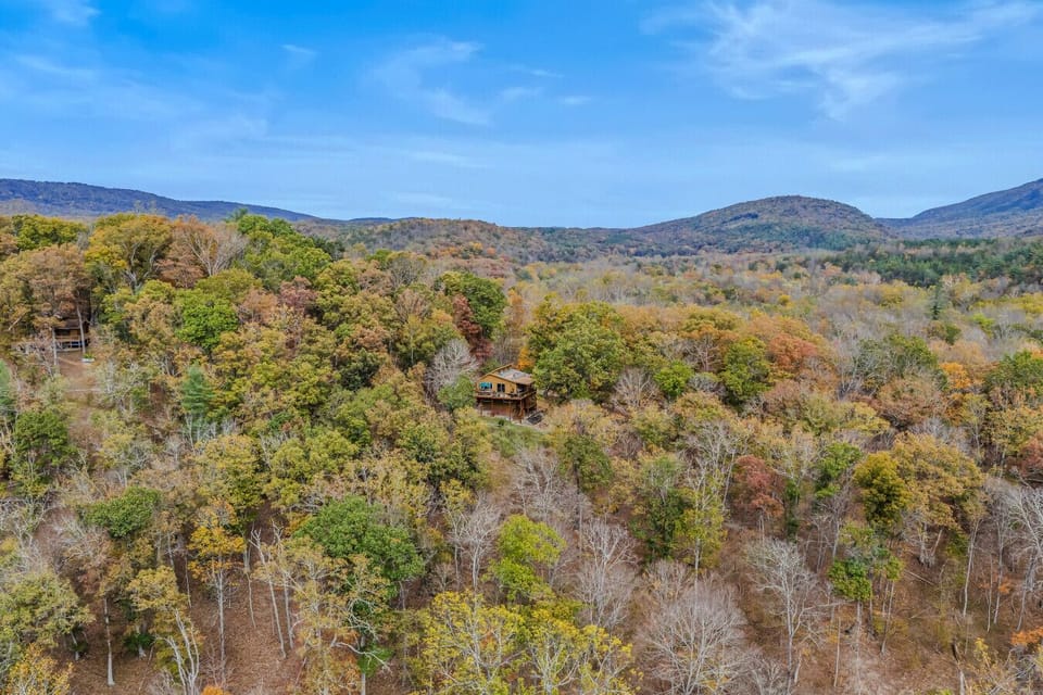 Nestled in the heart of Cacapon in a gated community of River Ridge