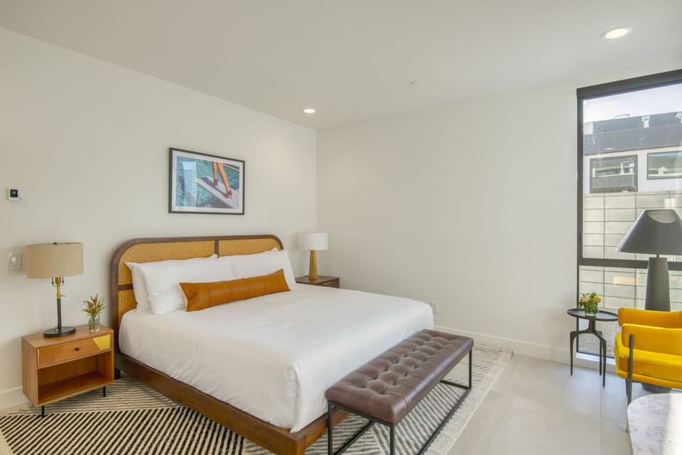 Bedroom 2 features a king bed and ensuite bathroom.
