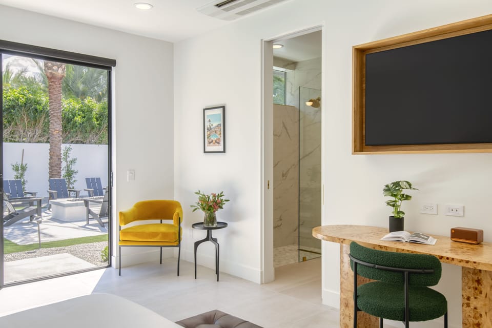 Experience the comfort of a bedroom with an en suite bathroom and convenient access to the patio.