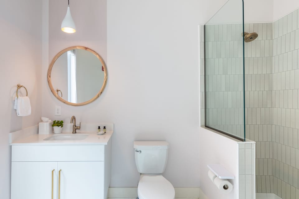 Primary bedroom's ensuite offers a shower.