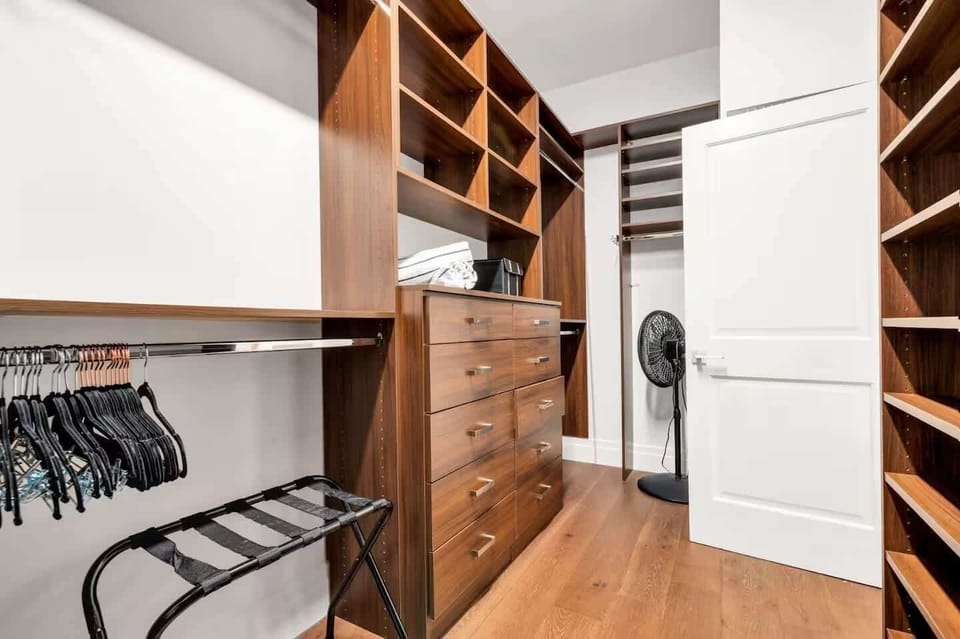 Large primary walk-in closet.