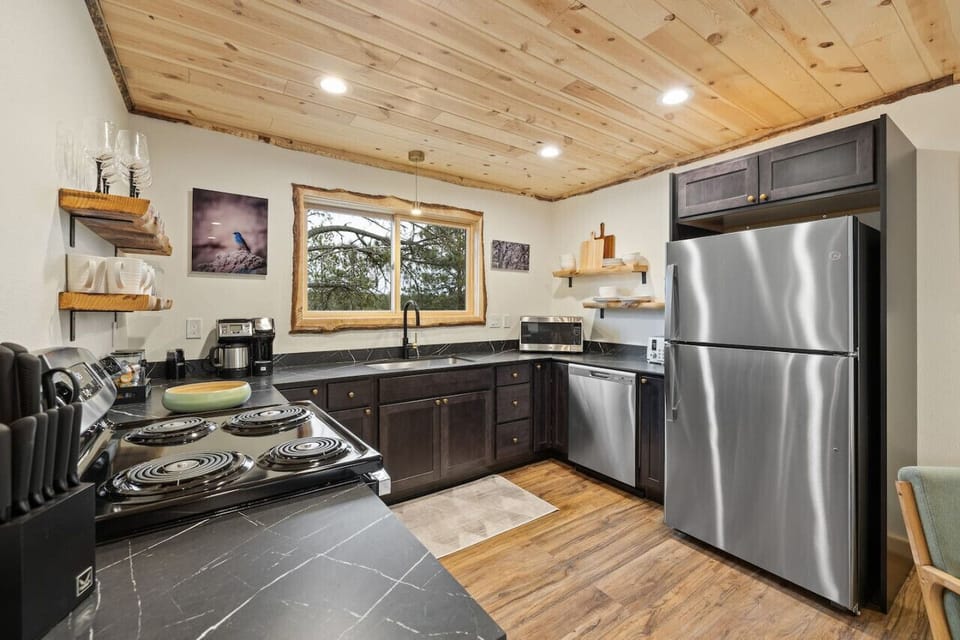 Prepare delicious meals in our modern and fully stocked kitchen
