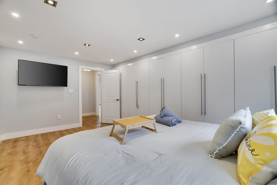 Master bedroom with a smart tv