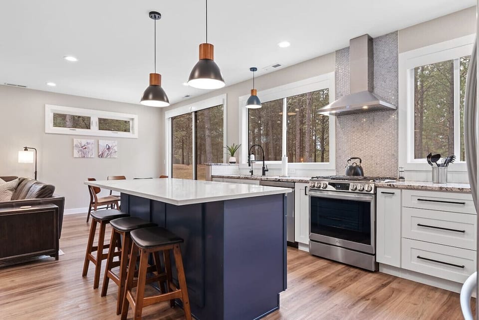 Experience the essence of home in our kitchen, where the countertop awaits your culinary adventures.