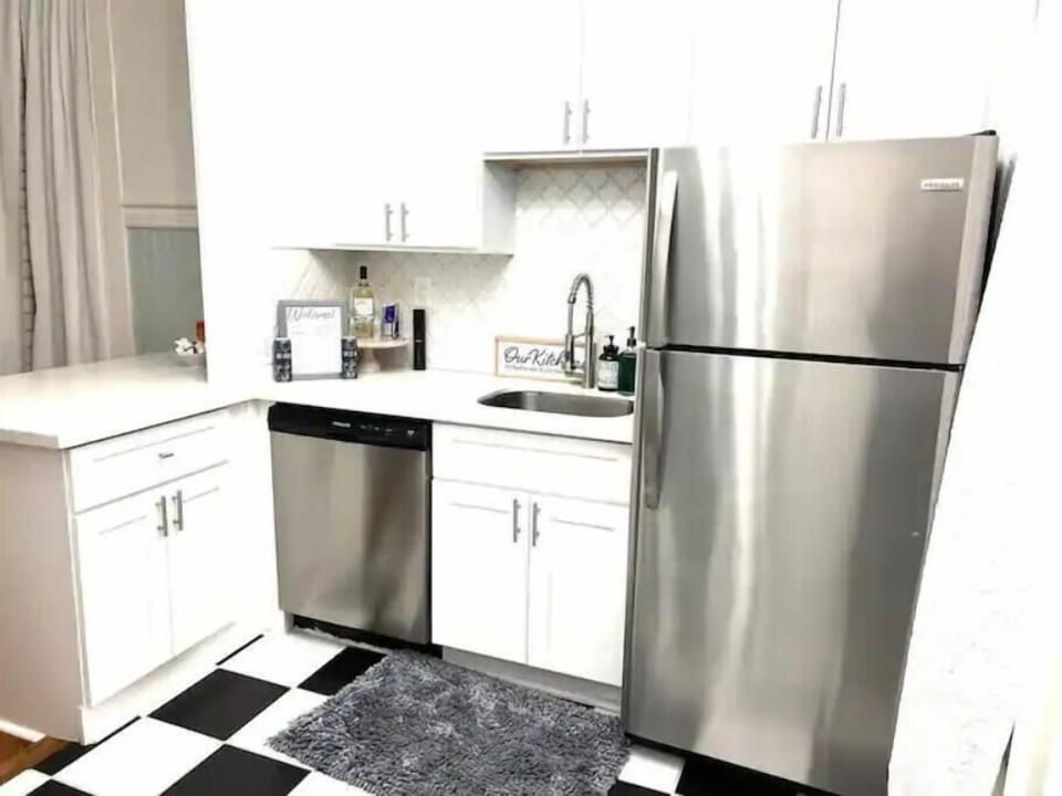 Your kitchen features a full-size stainless-steel dishwasher and refrigerator.