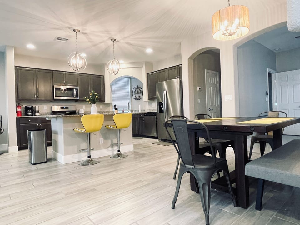 Dining Room & Bar Area Overlooking Modern Kitchen