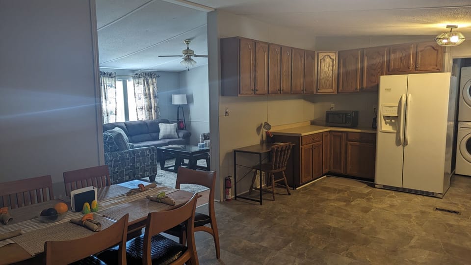 Convenient dining space, and dedicated desk/work space.