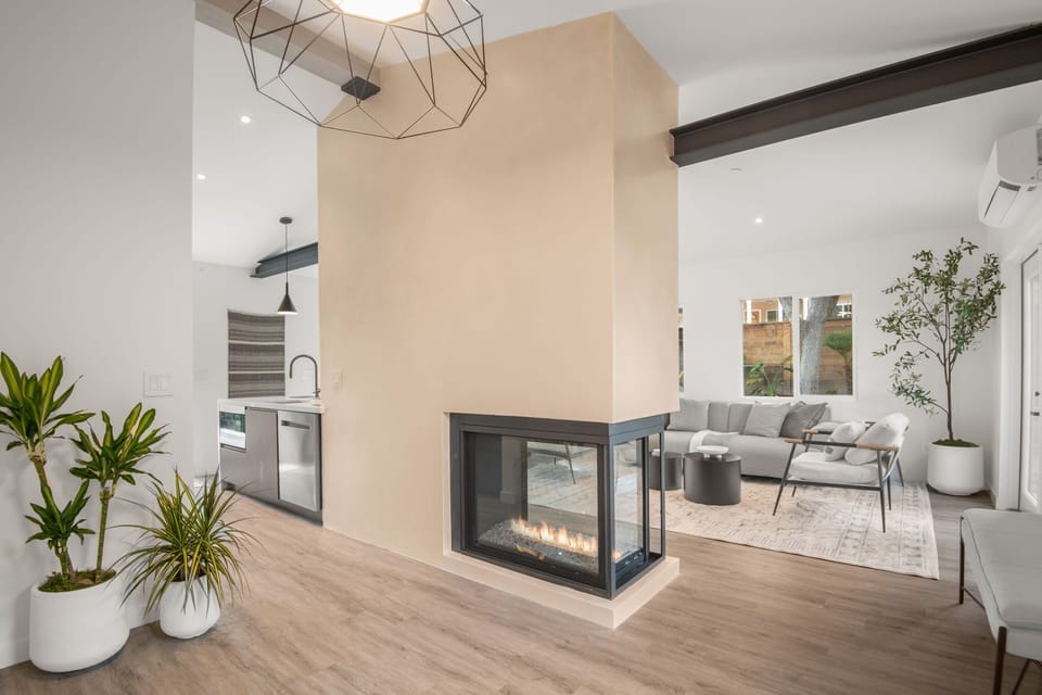Peninsula fireplace viewable from many location including master bedroom.